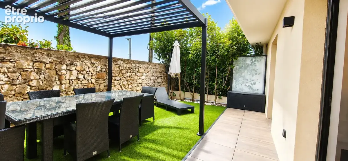 EXCLUSIVITE - Grand 2 pièces en rez de jardin + garage - photo 7