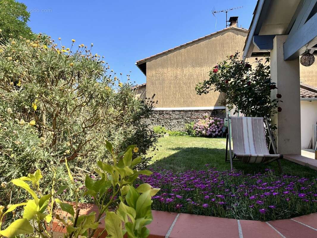 Maison T5 avec jardin en coeur de village - photo 4