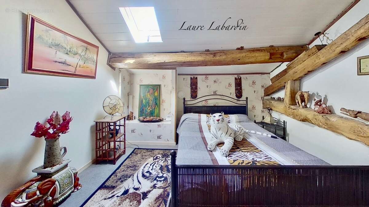 Maison en pierre de 155m2 - 4 chambres - à BIRAC SUR TREC (47) - photo 18