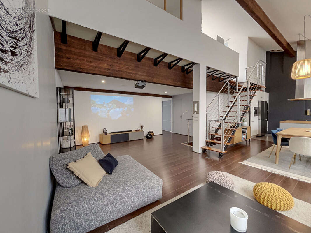 Duplex d'exception avec terrasse de 25m², spa et volumes rares - photo 7