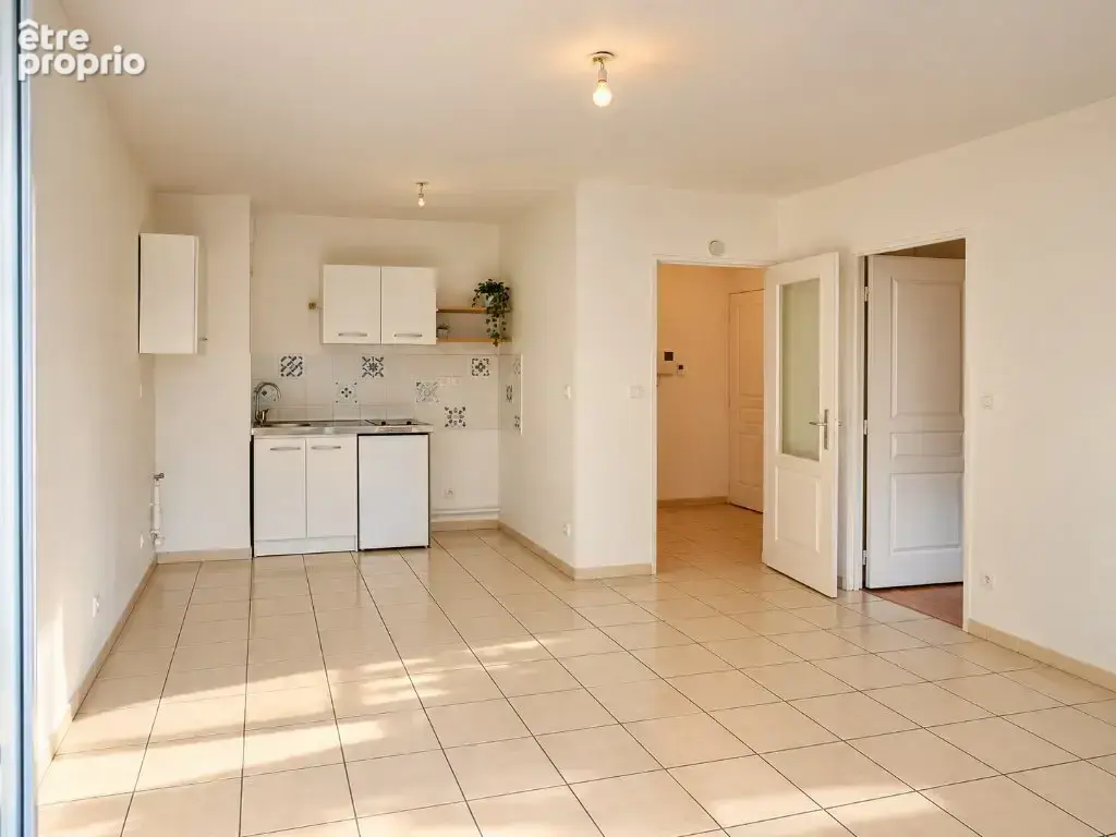 EXCLUSIVITÉ - TASSIN - 134, rue Joliot Curie, T2 en rez-de-jardin - photo 5