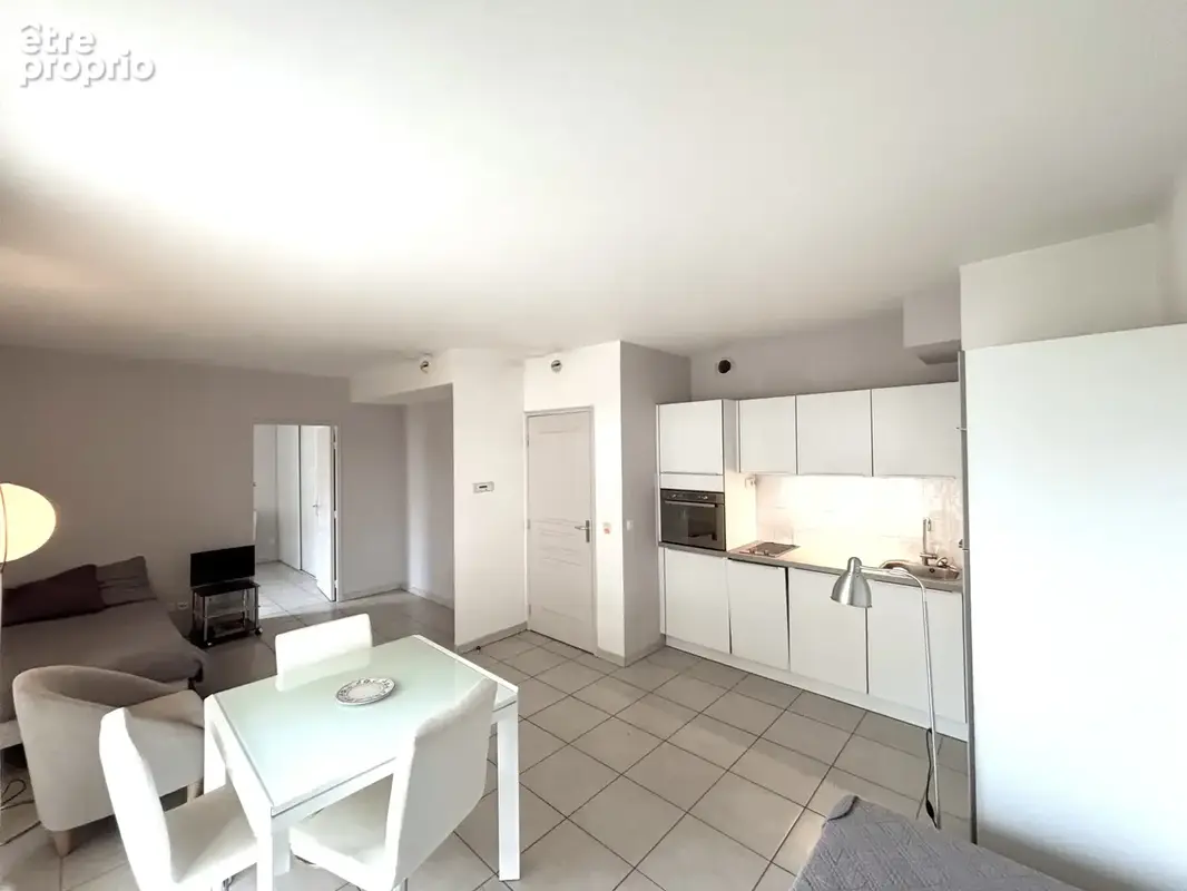 Appartement 2 pièces avec terrasse - Écrin de sérénité proche du Parc du 26e Centenaire - photo 2