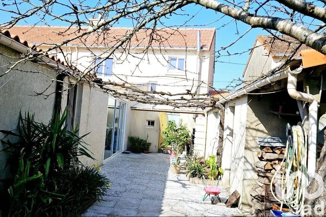 Photo 1 - Maison à BOUGUENAIS