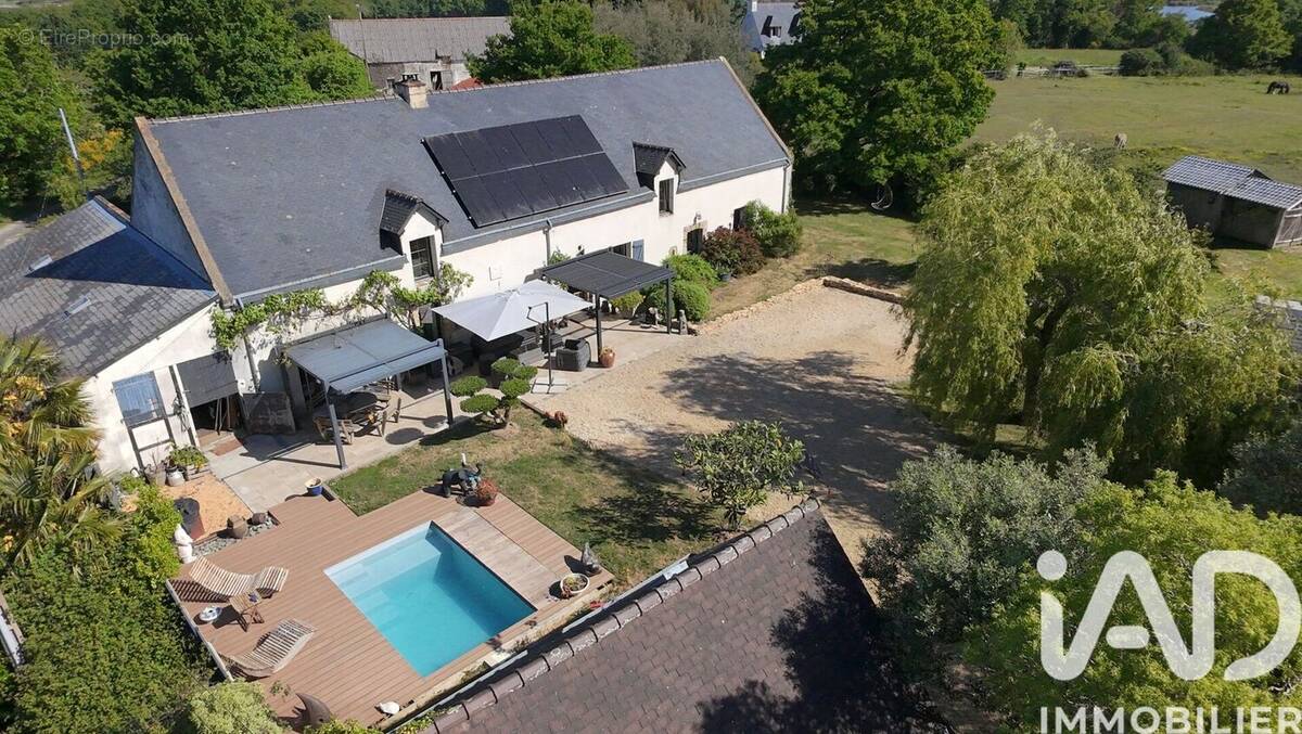 Photo 1 - Maison à LE TOUR-DU-PARC