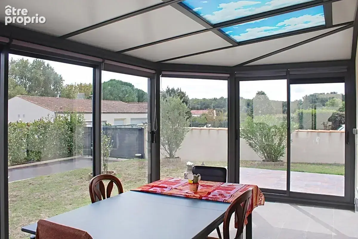 Maison de 110m² avec 3 chambres, véranda et garage à Saint Romain De Benet 289 000 - photo 9