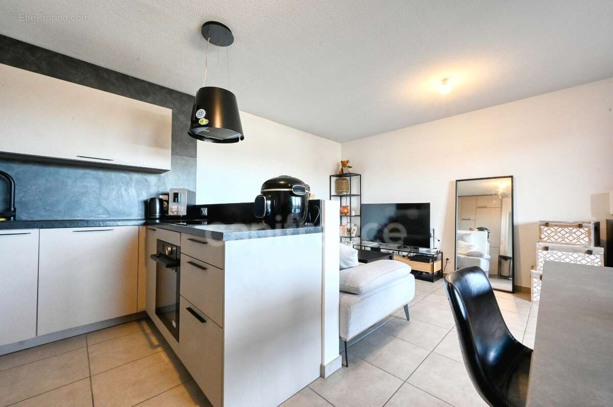 Appartement T3 en résidence sécurisée - photo 2