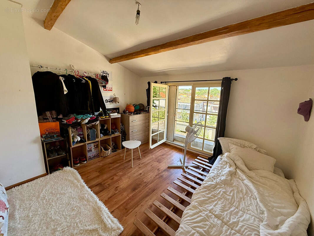 Maison de 198 m² avec deux logements distincts, terrasse, jardin et fort potentiel d'acquisition familiale ou patrimoniale - photo 14