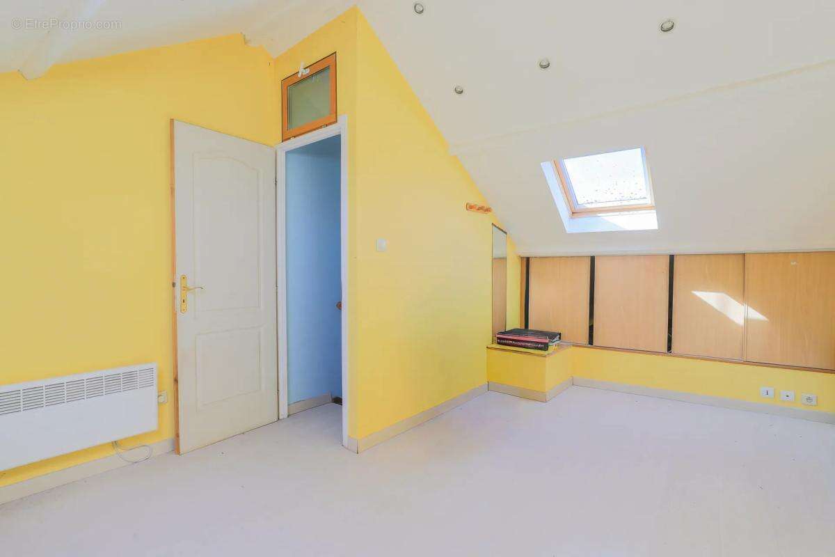 Maison de 4 pièces de 78 m² à Marcq-en-Barœul - photo 4
