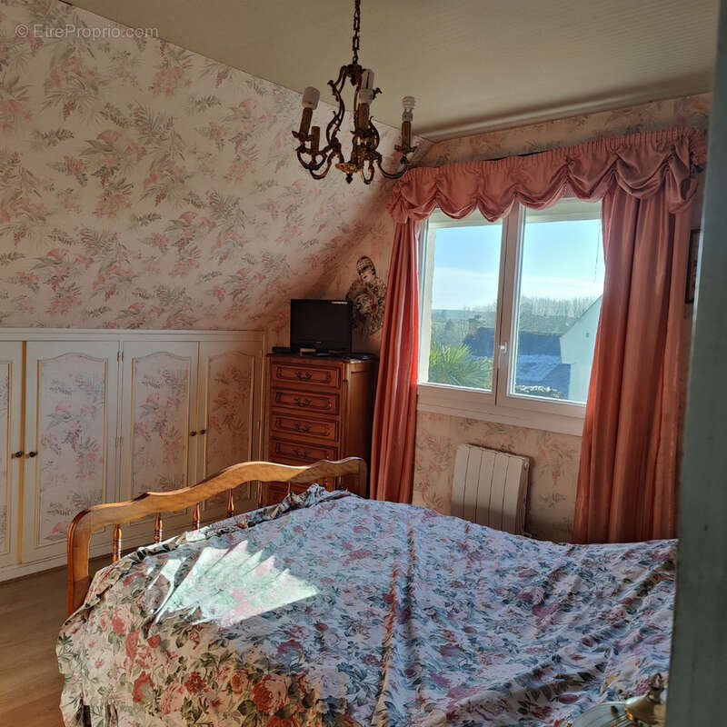 Maison à REGUINY