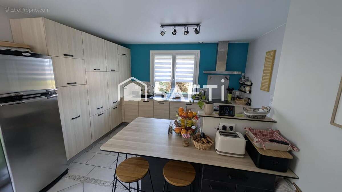 Maison 154 m² à Muizon  - photo 4