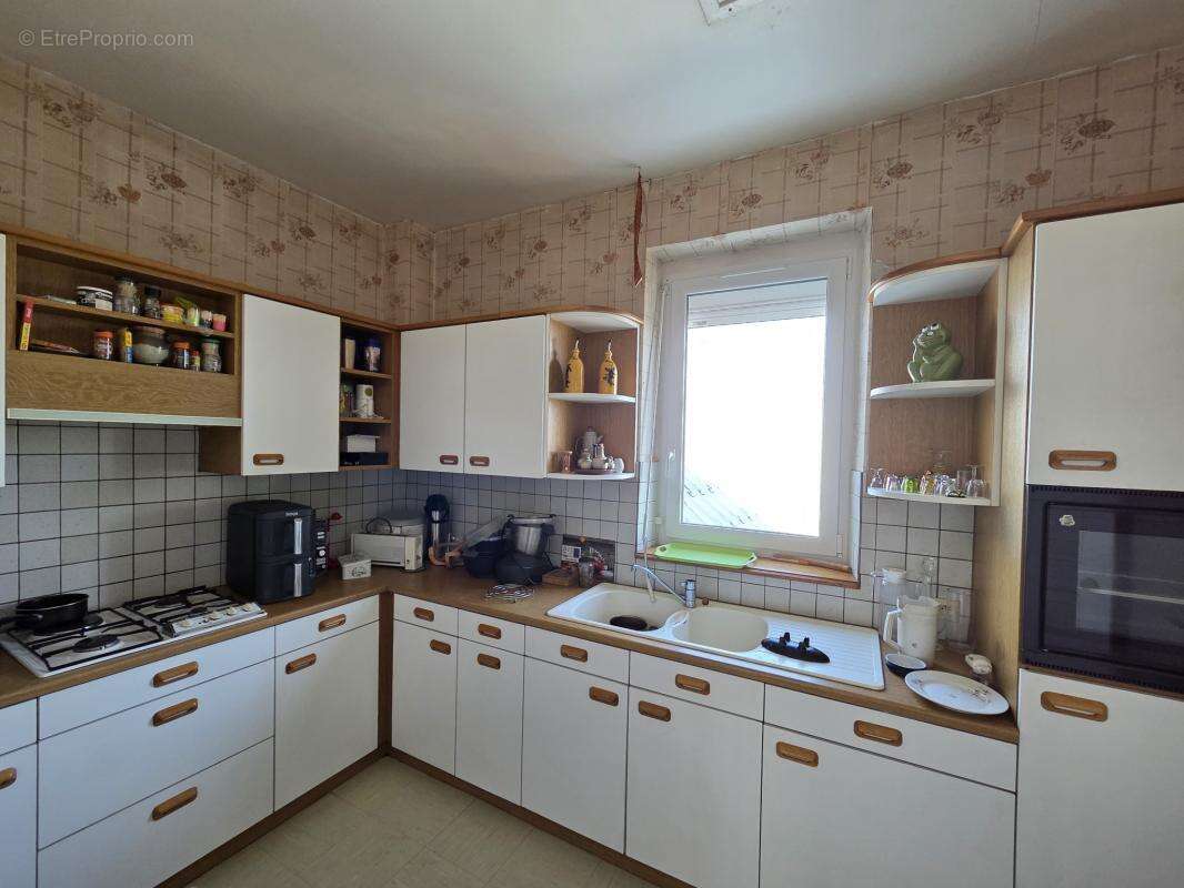 Ensemble immobilier 3 logements-parking- centre bourg neulli - photo 9