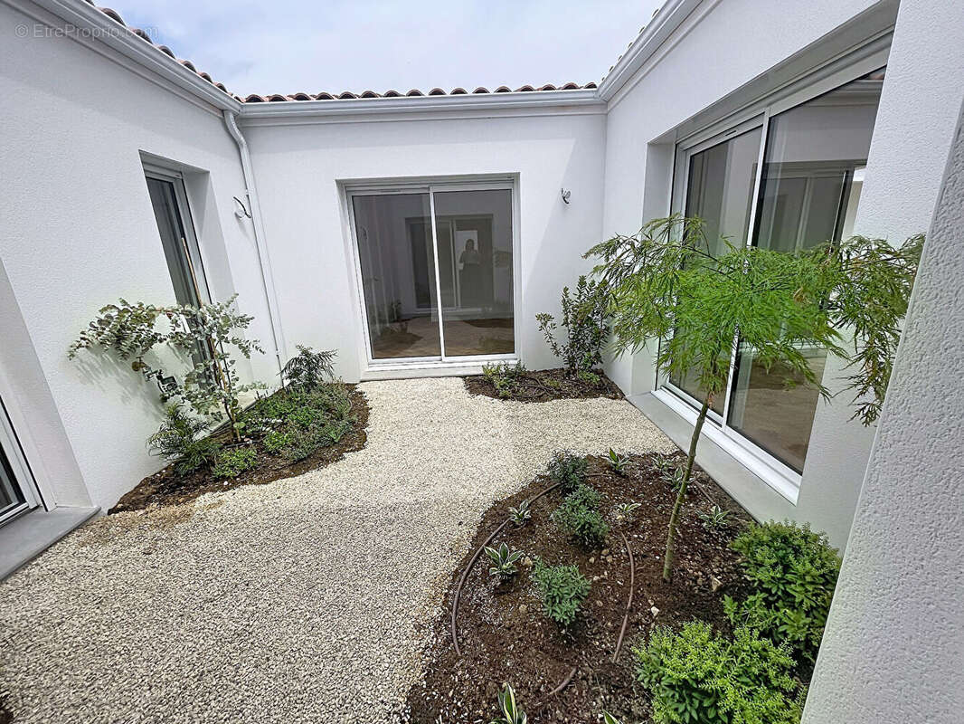 Maison La Jarrie 4 pièces 122 m2 - photo 2