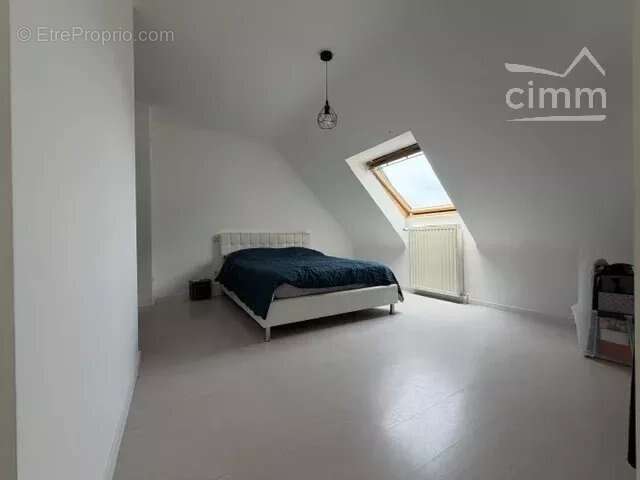 Maison 160 m² avec double garage de 100 m² - photo 12