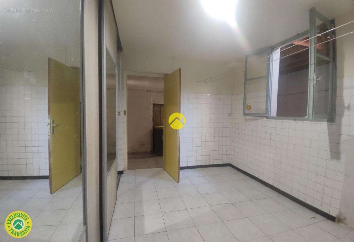 Immeuble de rapport en centre-ville - photo 6