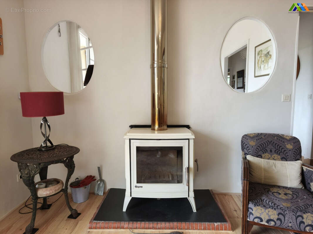 Character fireplace adding charm to the living space.