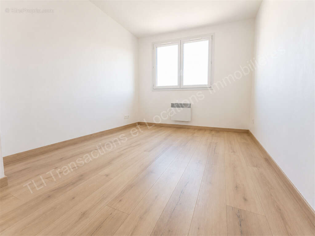Appartement T3 avec terrasse et jardin privatif - photo 3