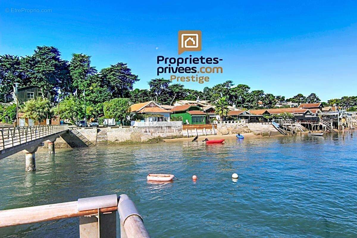Dept 33 - CAP FERRET - LE CANON / PIRAILLAN - Maison Architecte Vue Mer 5 pièce(s) 113 m2 sur un terrain de 1187m2 - photo 3