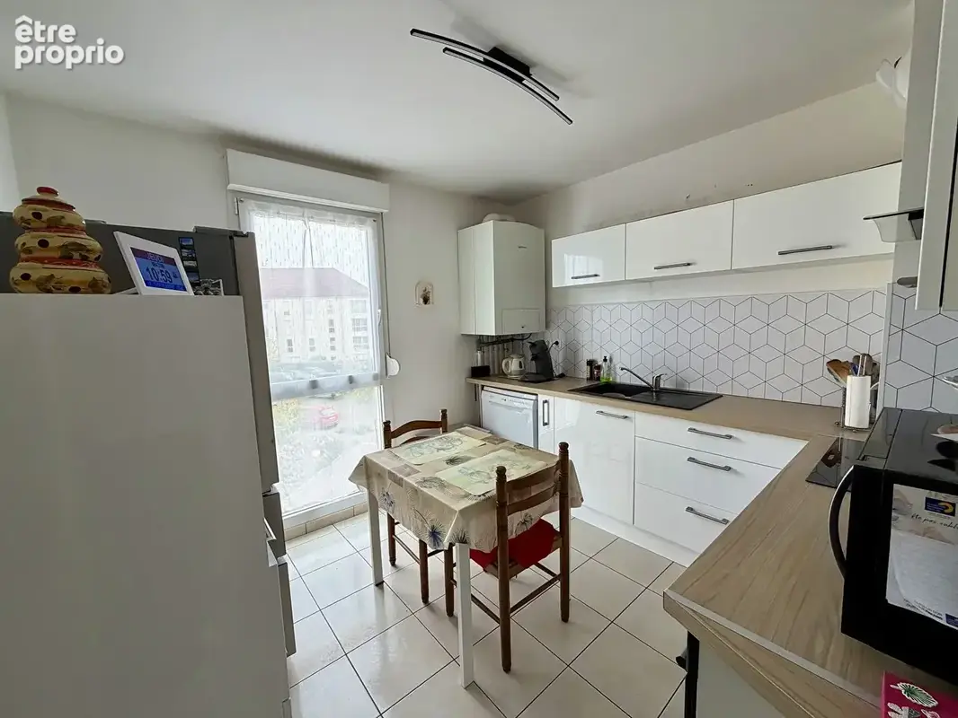 Appartement Chevigny St Sauveur 3 pièces 68.11 m2 - photo 4