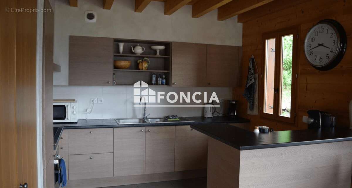 Un chalet d’exception, alliant charme authentique et confort - photo 5