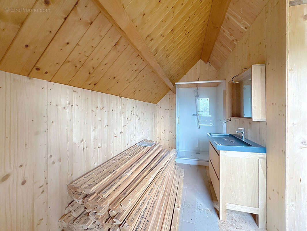 Grande maison à ossature et bardage bois - photo 13