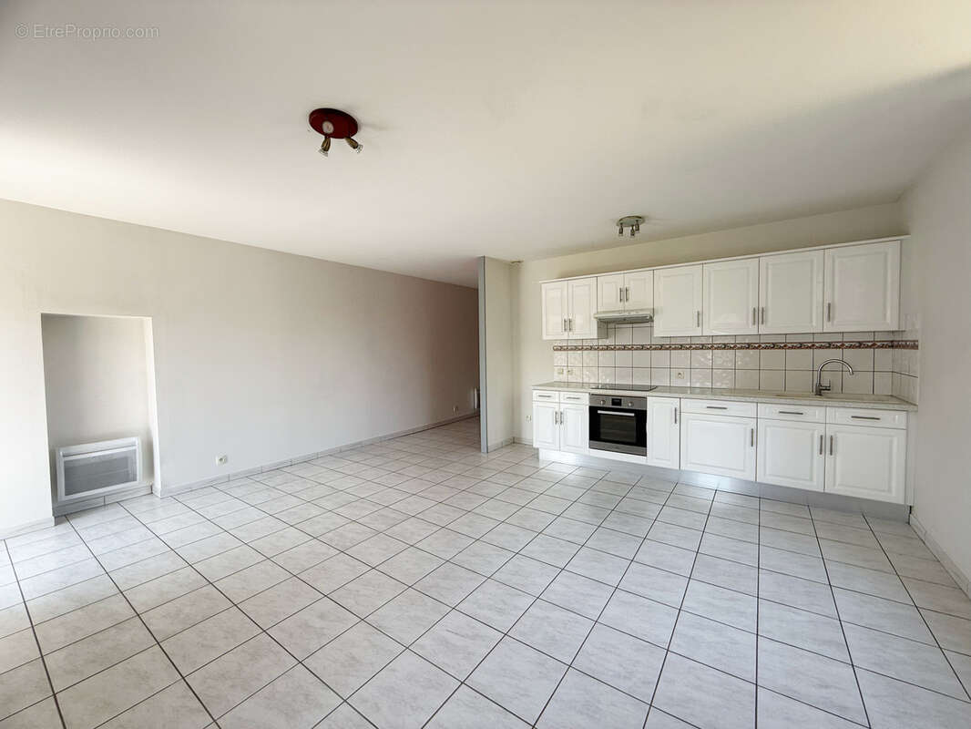 Appartement T3 avec balcon et place de parking - photo 9
