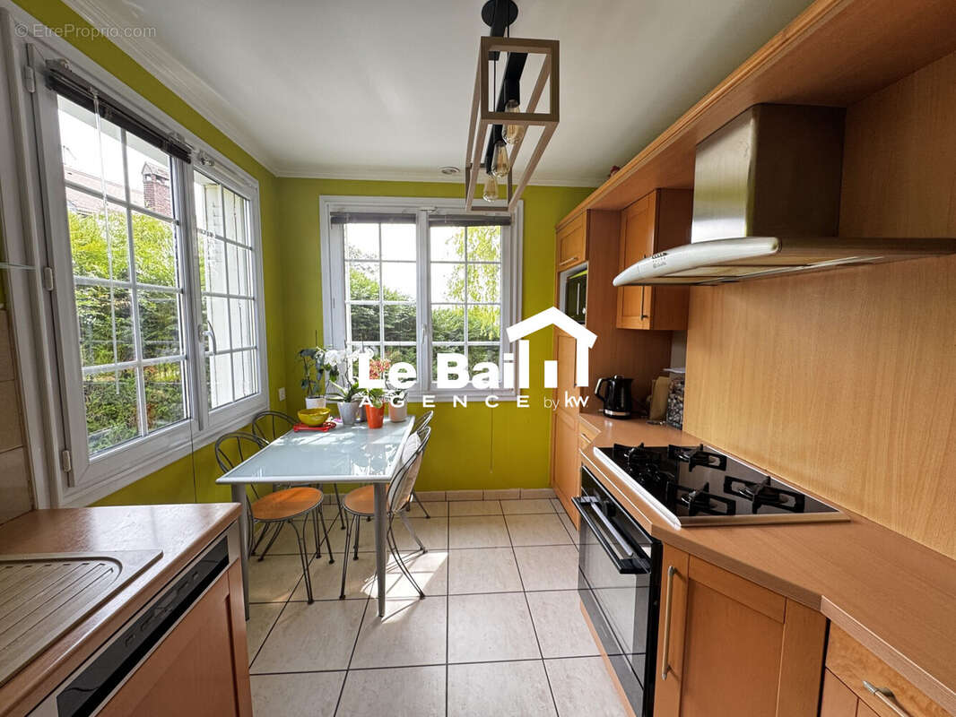 Maison 94 m² à Osny  - photo 7