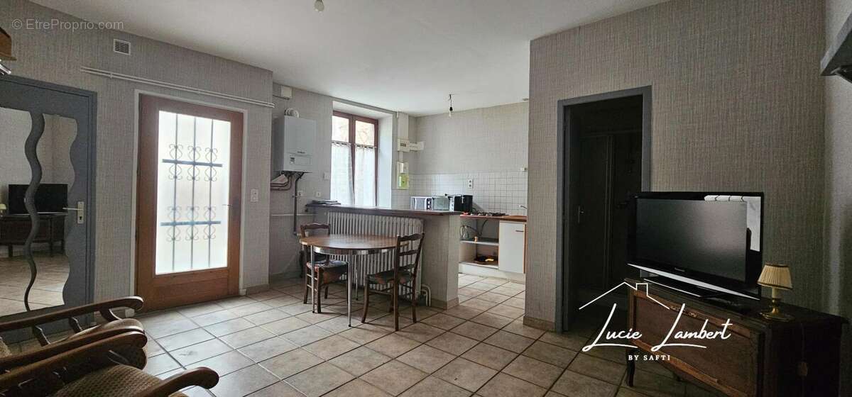 Photo 3 - Maison à LE BREUIL-SUR-COUZE