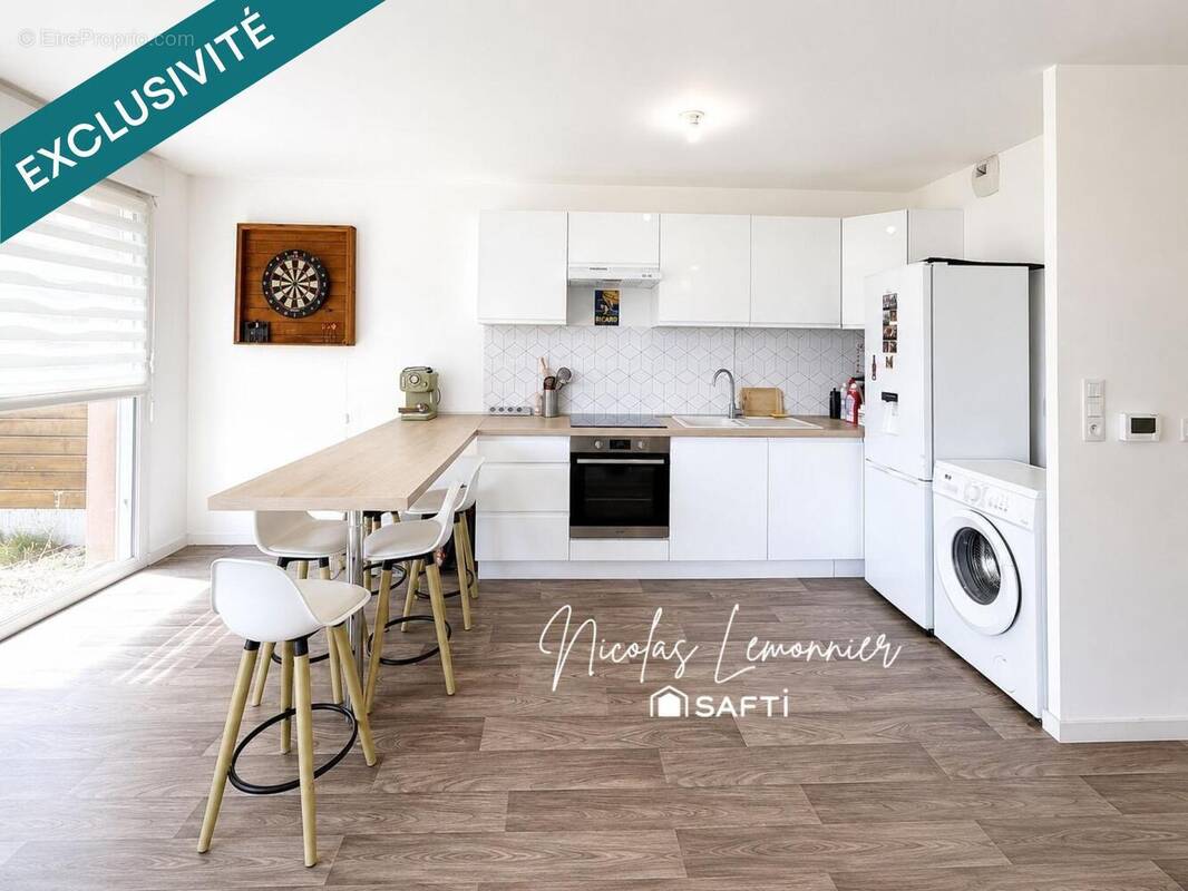 Photo 1 - Appartement à HEROUVILLE-SAINT-CLAIR