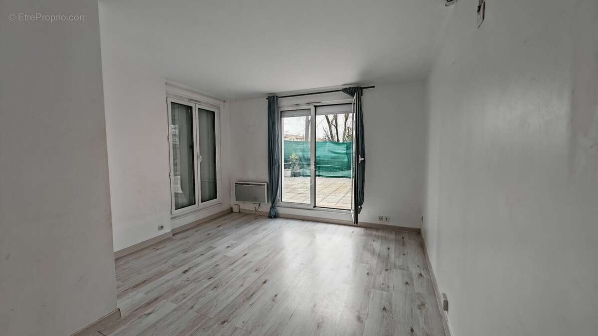 Appartement T4 au RDC avec terrasse 50 m²- Proche transport RER - photo 3