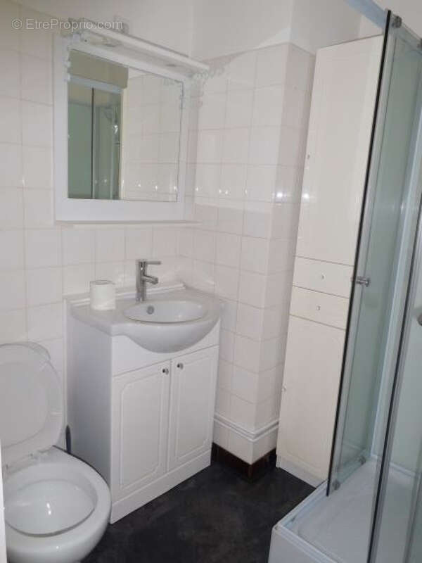 Ensemble immobilier d'habitations et de commerces - photo 10