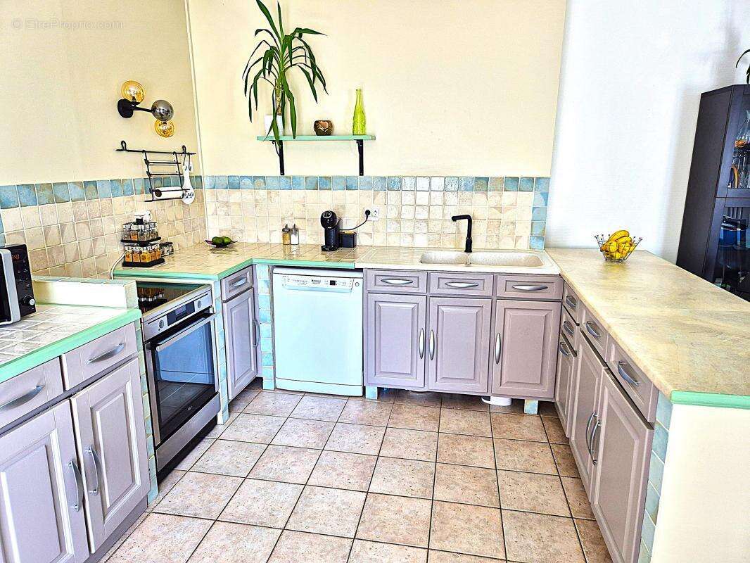 Maison à SAINT-GENIS-LES-OLLIERES