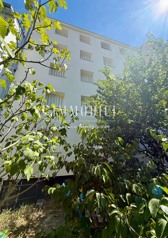 T3 traversant de 52 m2 au cœur du quartier États-Unis - 2ᵉ étage d'une copropriété - photo 2