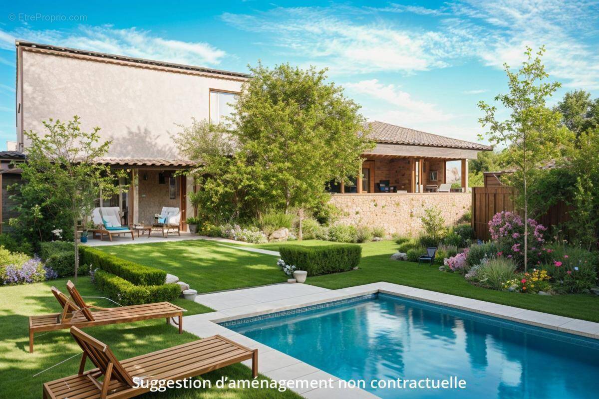 Maison à LAUDUN-L&#039;ARDOISE