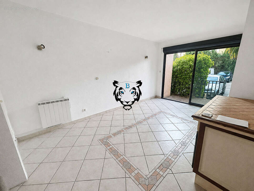 Studio rez de chaussée - terrasse - parking - cave - 26.37 m2 - photo 3