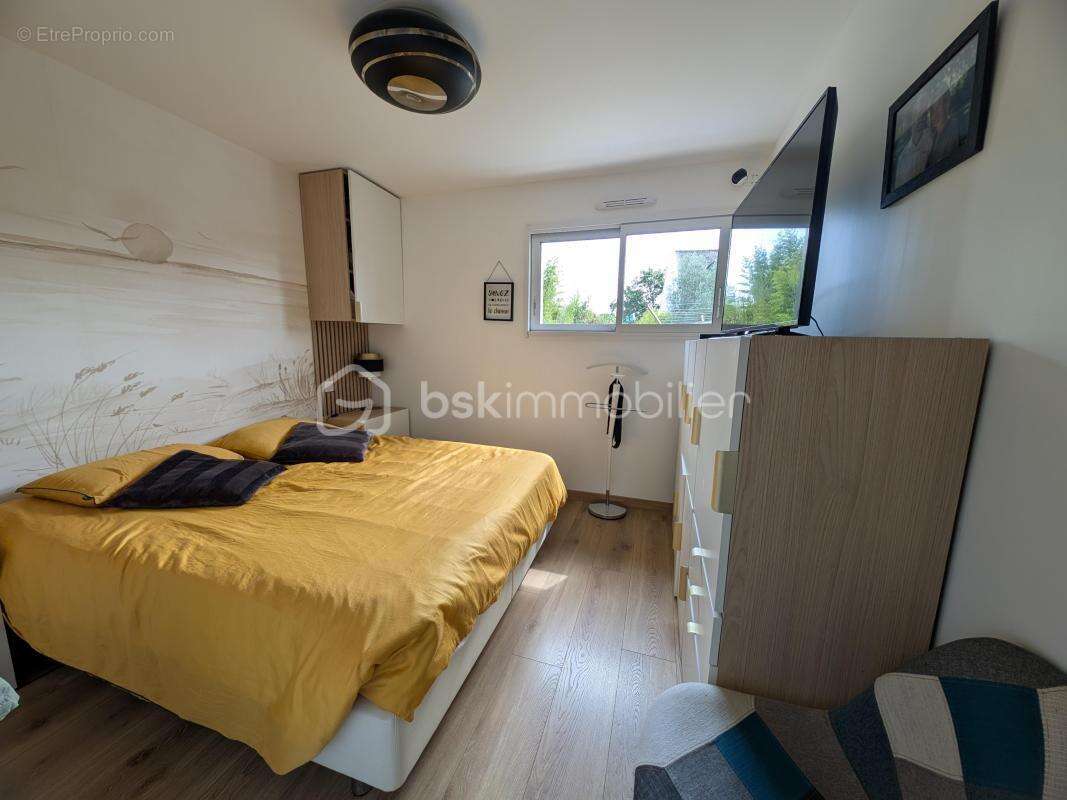Aux portes de Rennes, à seulement 5 minutes du centre de Cesson-Sévigné, laissez-vous séduire par cette magnifique maison contem - photo 11