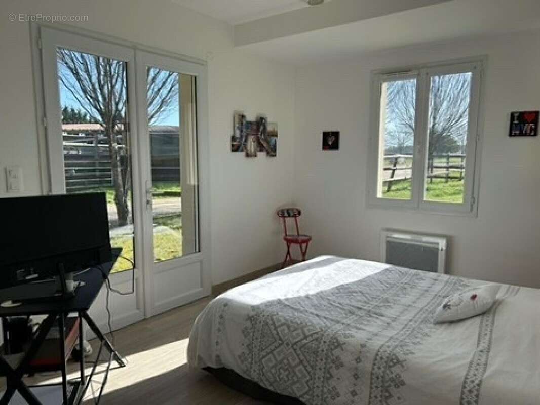 Photo 9 - Maison à LES EGLISES-D&#039;ARGENTEUIL