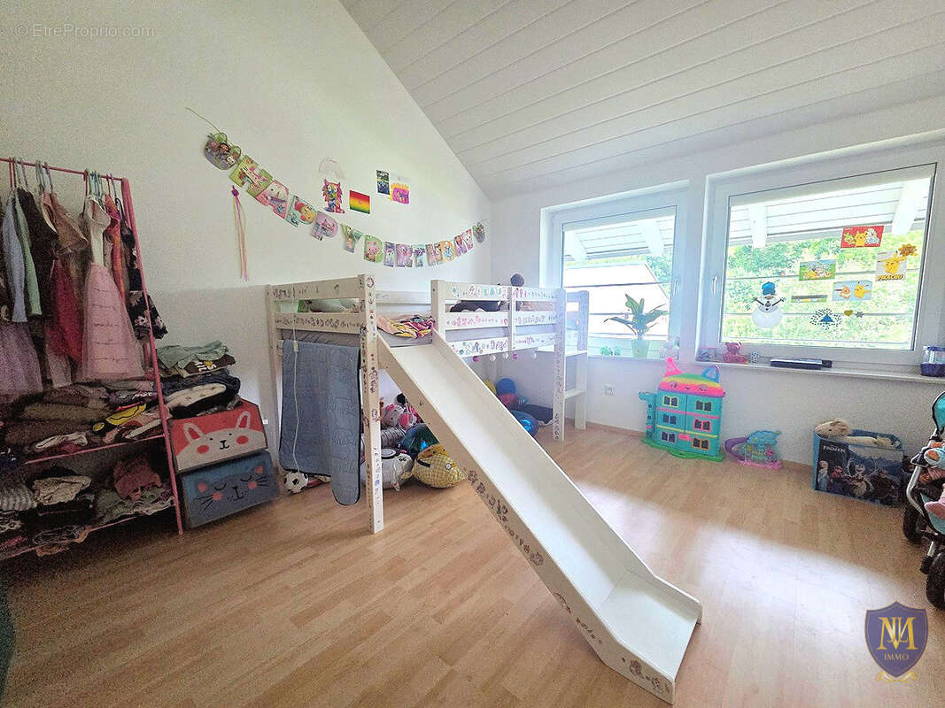 Blotzheim très au calme belle maison 6 pièces de 125 m2 sur 7,91 ares - photo 9