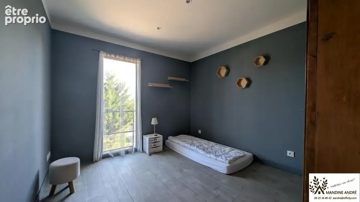 Maison 5 pièces 141 m² à vendre à Saint-Bernard (01600) - photo 9