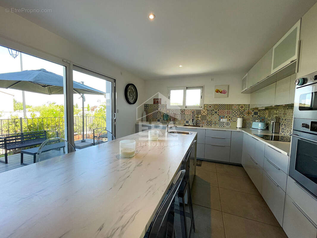 Maison 88m² à malemort-du-comtat - photo 7