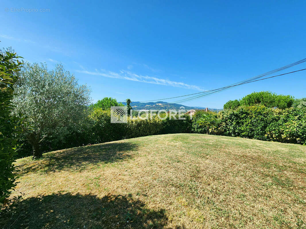 Maison d'architecte de 133 m² avec garage et jardin de 806 m² à Massieux - photo 3