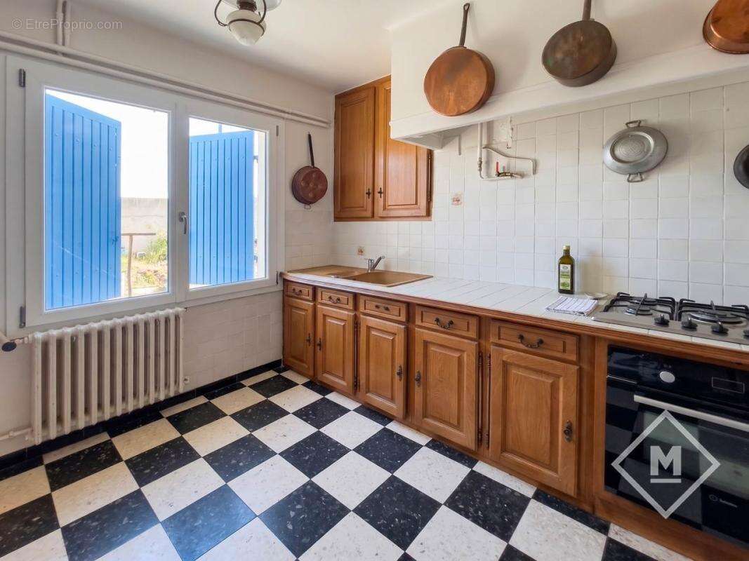 Maison 4 chambres à vendre à berre-l'étang (13130) - grand potentiel sur terrain de 985 m² - photo 12