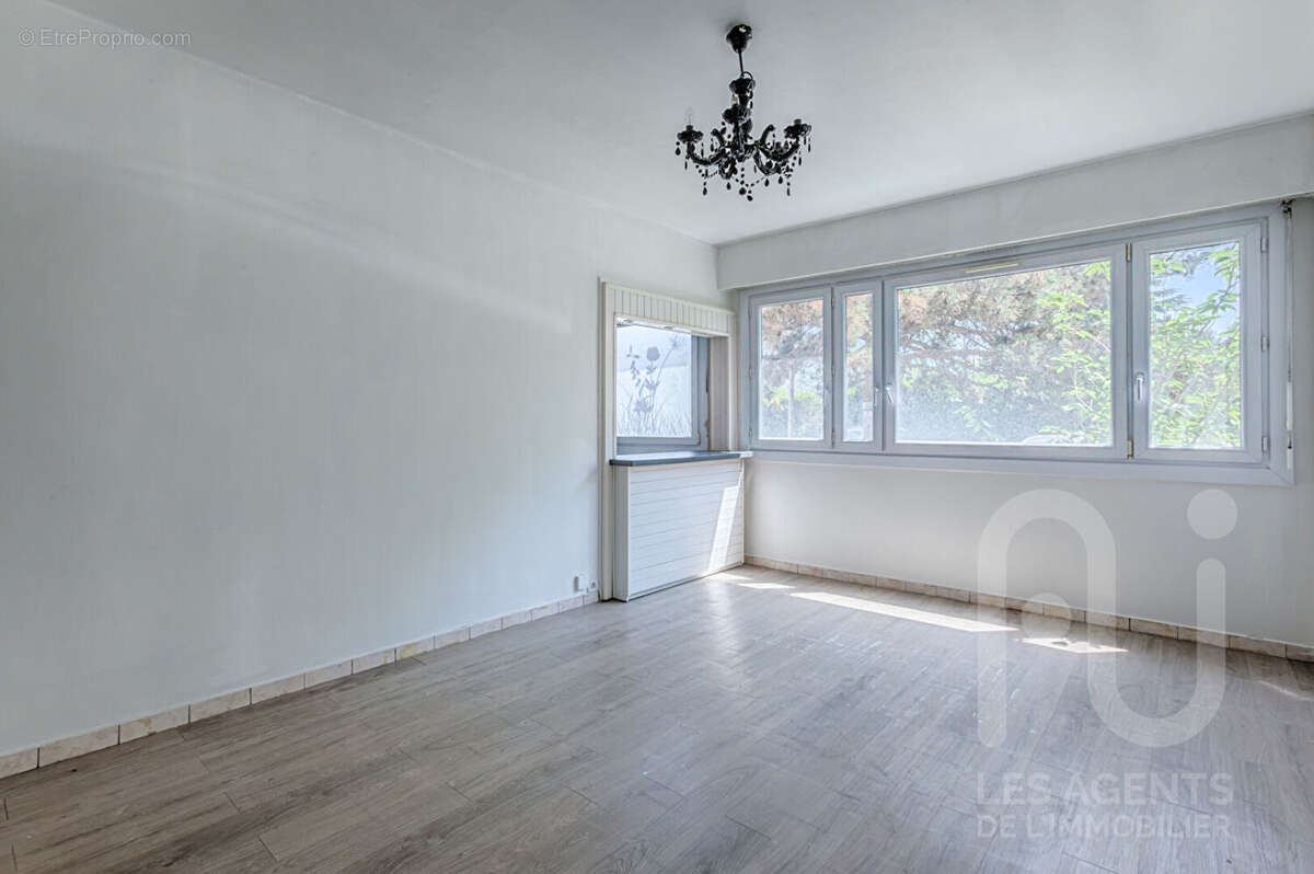 3 pièces 61 m² avec cave et parking Résidence semi-récente - photo 2
