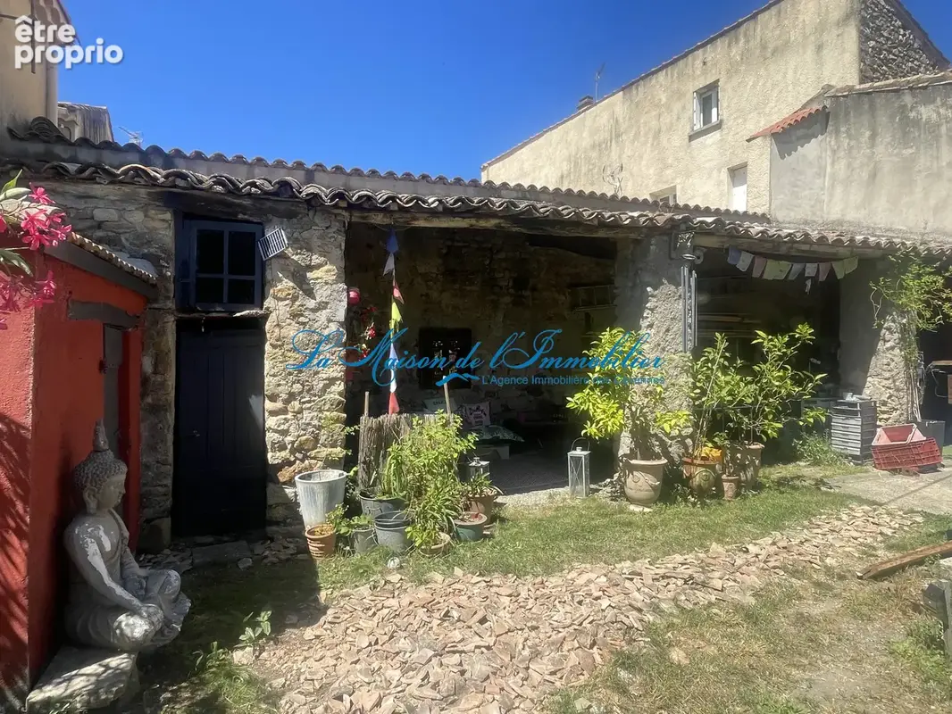 ST CHRISTOL LES ALES, maison en pierres F5 avec dépendances, chalet, piscine sur 2482 m2 de terrain avec puit - photo 13