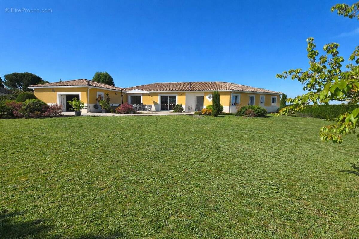 Photo 1 - Maison à LAROQUE-TIMBAUT