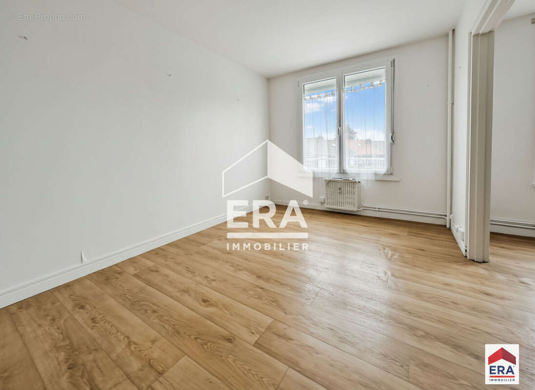 Appartement T3 - 68 m² - 2 chambres - Cave - photo 2