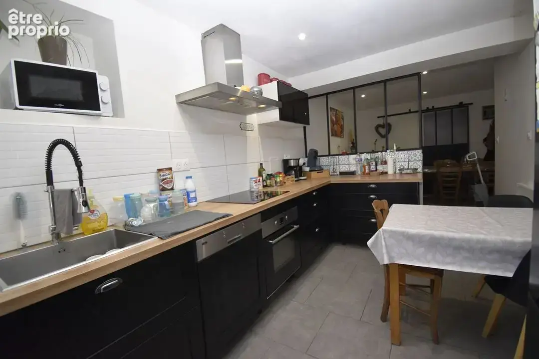 Maison 6 pièces 91 m² à vendre à Caudry (59540) - photo 4