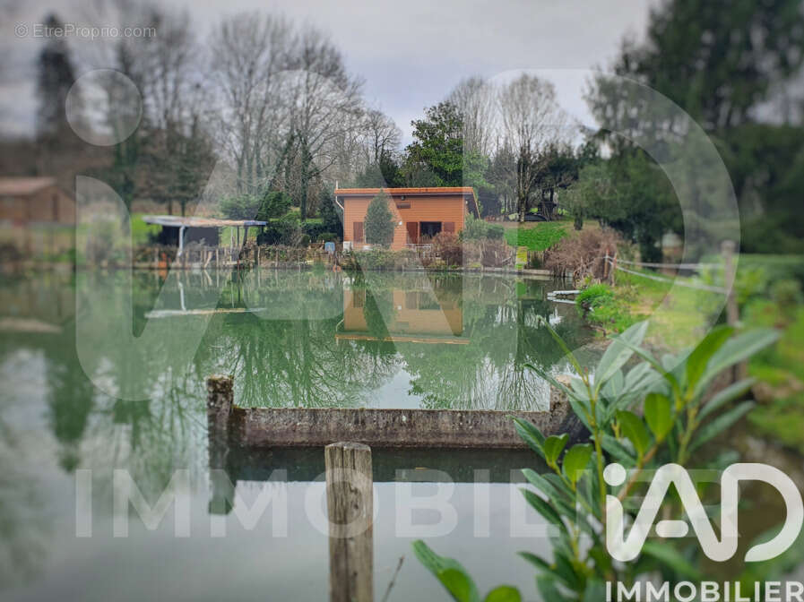 Photo 2 - Terrain à MONTEMBOEUF