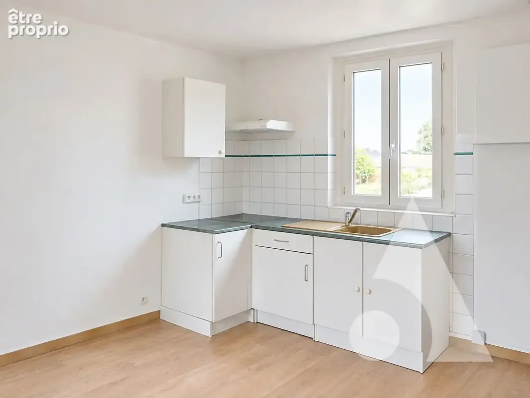 Immeuble / Ensemble immobilier 1 garage + 4 appartements - photo 5