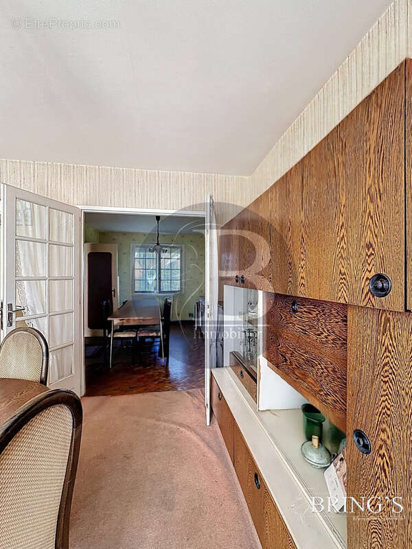 Séjour ouvert sur cuisine - Maison à CHATEAUBRIANT