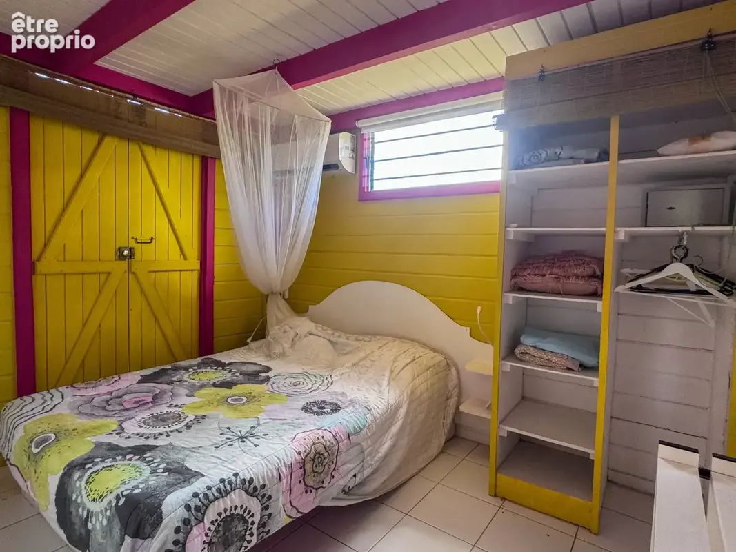 Bungalow coloré avec terrasse au cœur d’un jardin tropical - photo 9